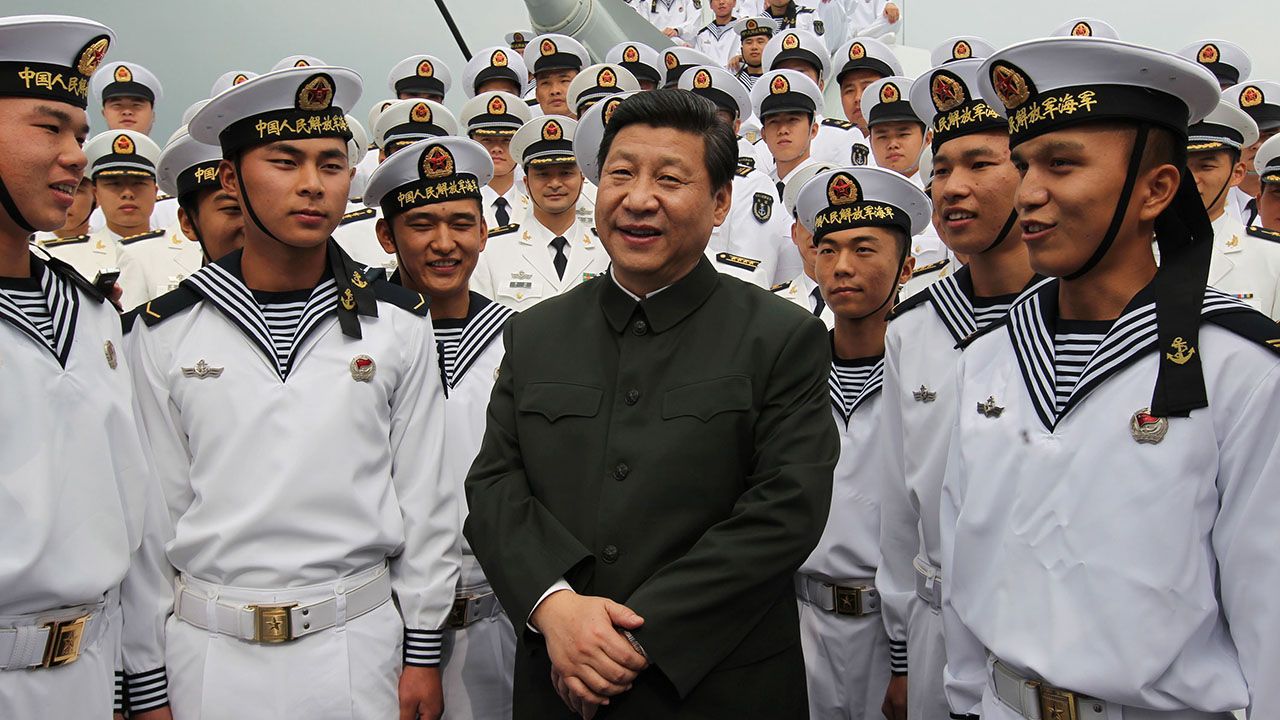 President Xi Jinping talks with soldiers onboard a Chinese destroyer-class ship